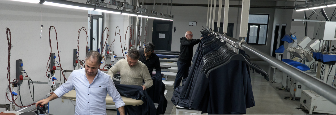 The team reviewing garments at Sarpteks