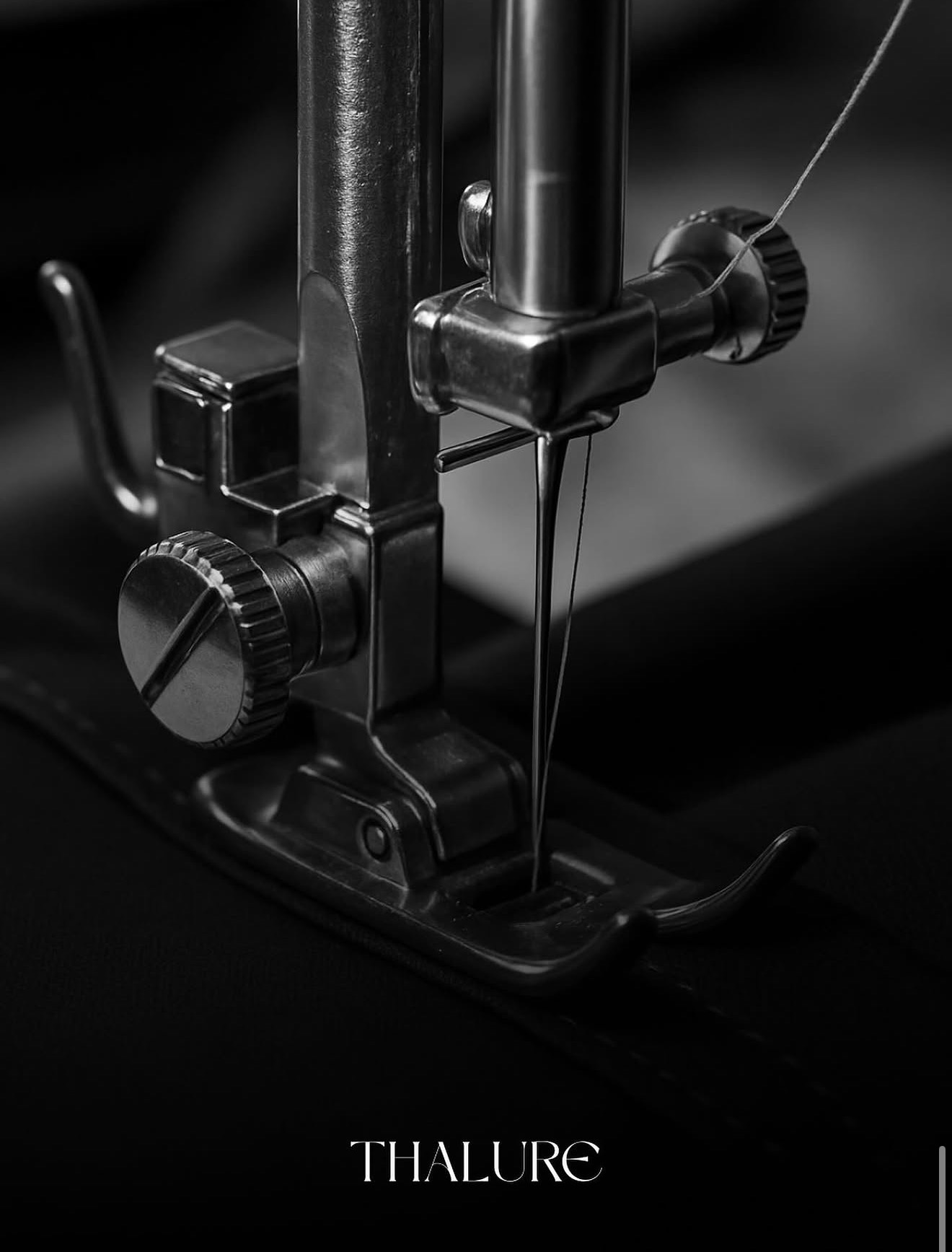 Close-up of an industrial sewing machine